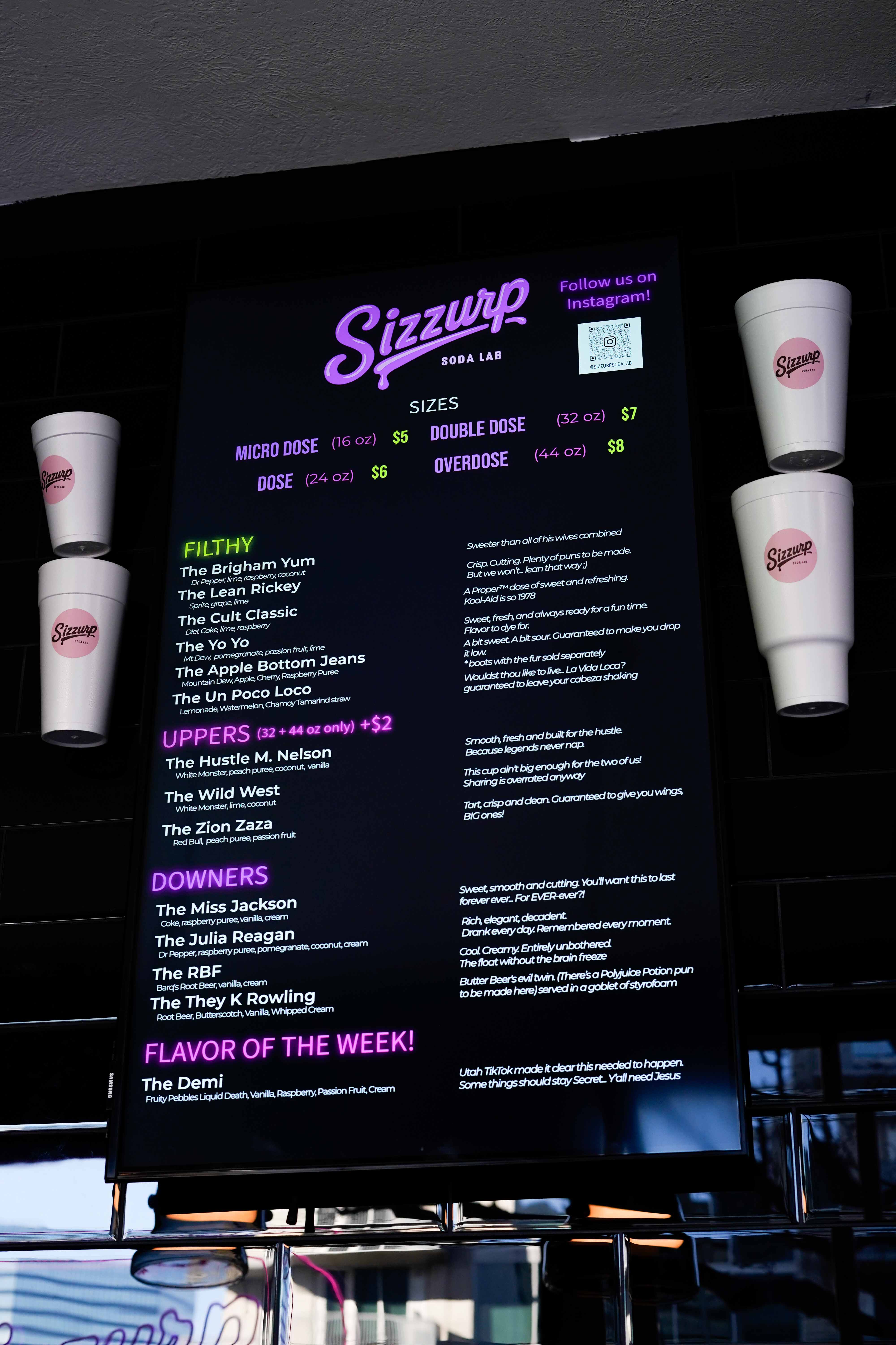 Sizzurp Soda Lab catering-style counter setup with colorful dirty sodas ready to serve
